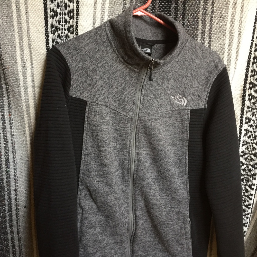 Black and grey north face jacket